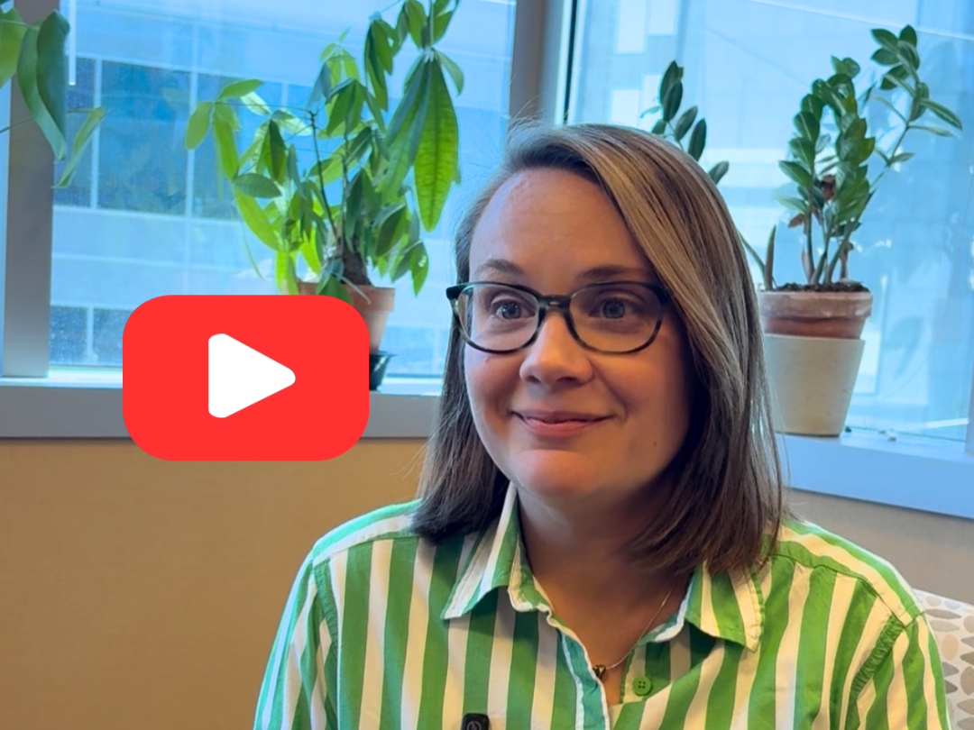 Ali Kowitz in her office talking to someone off camera.