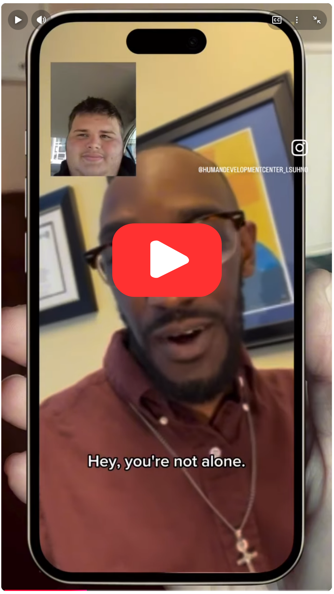 iphone screen showing a facetime between Will and another advocate. The caption reads "You're not alone."