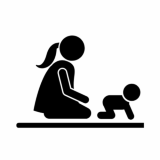 Child crawling in front of woman who is kneeling
