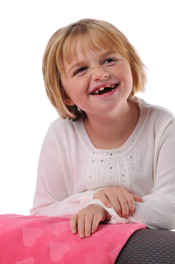 Young girl smiling.