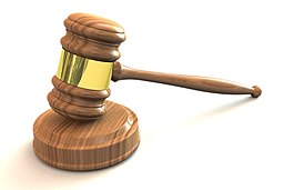 Wooden gavel: Rule or law takes effect
